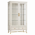 Vitrine Faverino en bois blanc et verre de 100x40x180 cm avec tiroirs, style contemporain dans une pièce moderne.